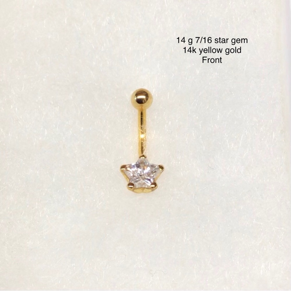 14 g 7/16 curved barbell for navel piercing. 14k yellow gold.